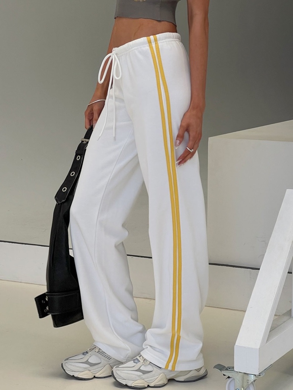 Princess Polly White Track Pants with Yellow Side Stripes